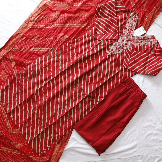 Red and white patterned fabric on a white background